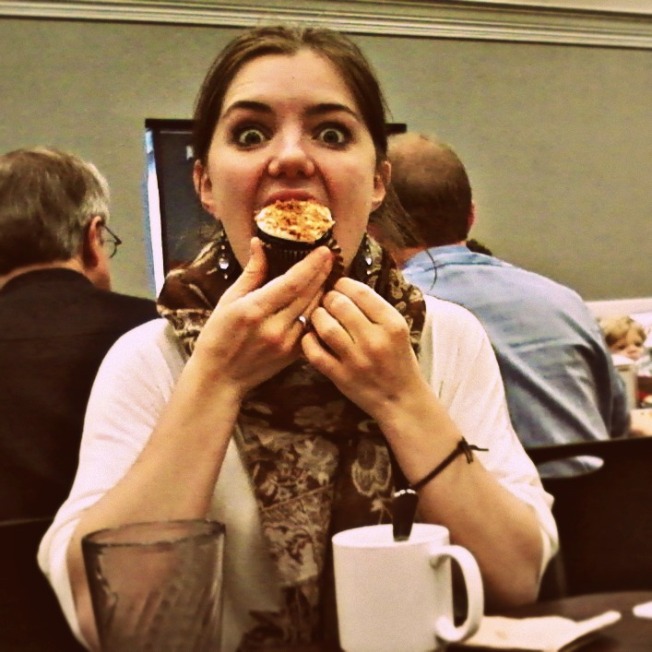 Me, eating a bacon cupcake. Don't judge.